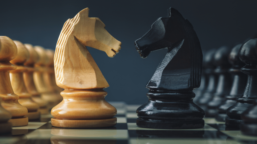 Banner _ Dois cavalos de xadrez se confrontando - Psicologia no Esporte