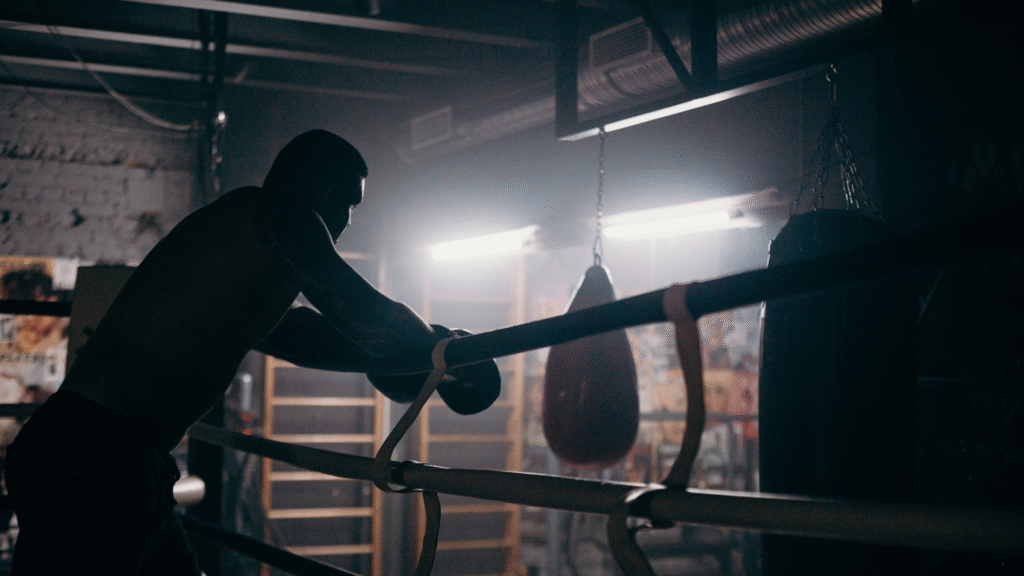 Banner _ Homem em um ringue de boxe - Psicologia no Esporte