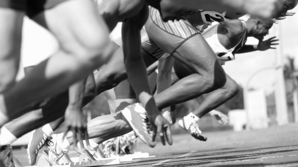 Banner _ Várias pessoas em uma corrida - Psicologia no Esporte